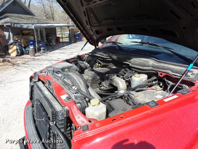 image for item BH9305 2005 Dodge Ram 3500 Quad Cab flatbed pickup truck