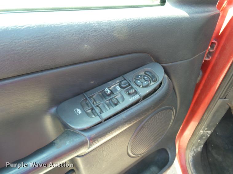 image for item BH9305 2005 Dodge Ram 3500 Quad Cab flatbed pickup truck