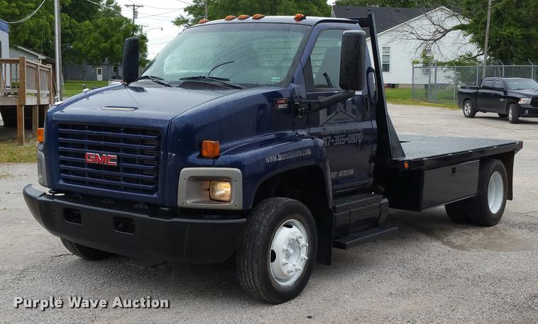 image for item BS9487 2003 GMC C6500 flatbed truck