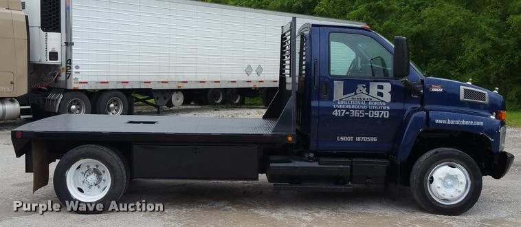image for item BS9487 2003 GMC C6500 flatbed truck