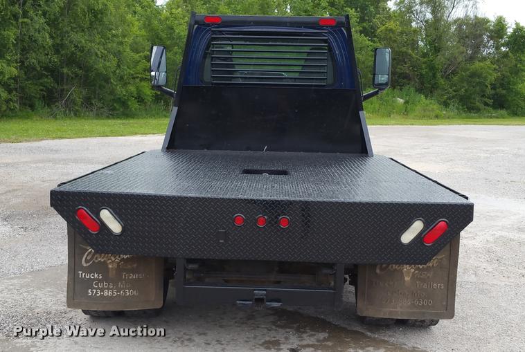 image for item BS9487 2003 GMC C6500 flatbed truck
