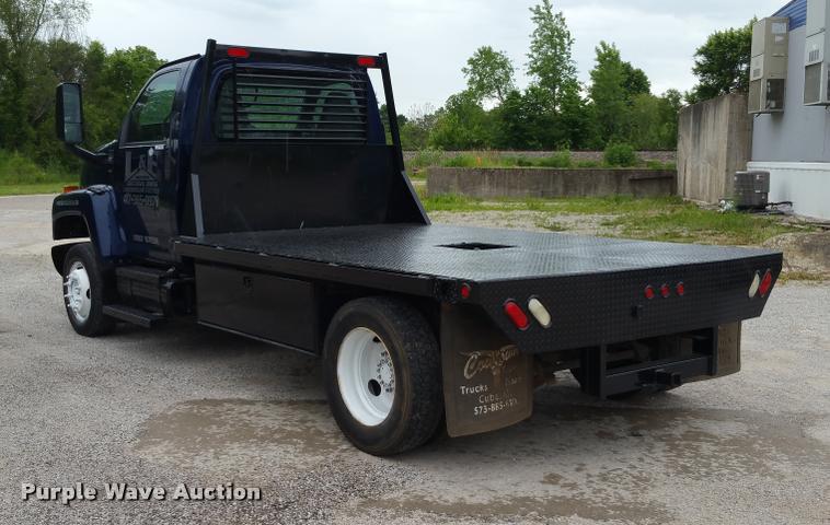 image for item BS9487 2003 GMC C6500 flatbed truck