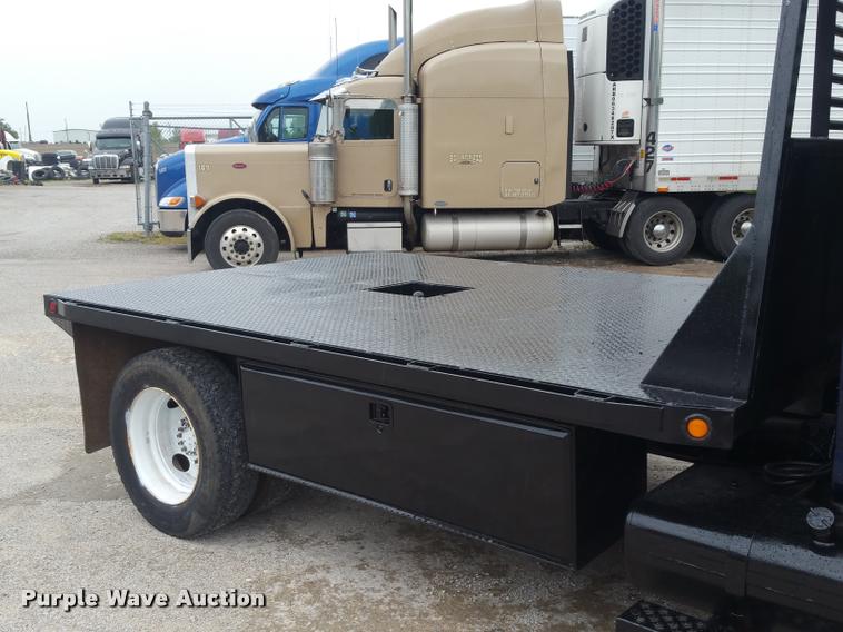 image for item BS9487 2003 GMC C6500 flatbed truck