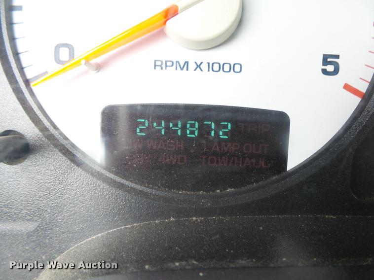 image for item DA2685 2005 Dodge Ram 3500 Quad Cab flatbed pickup truck