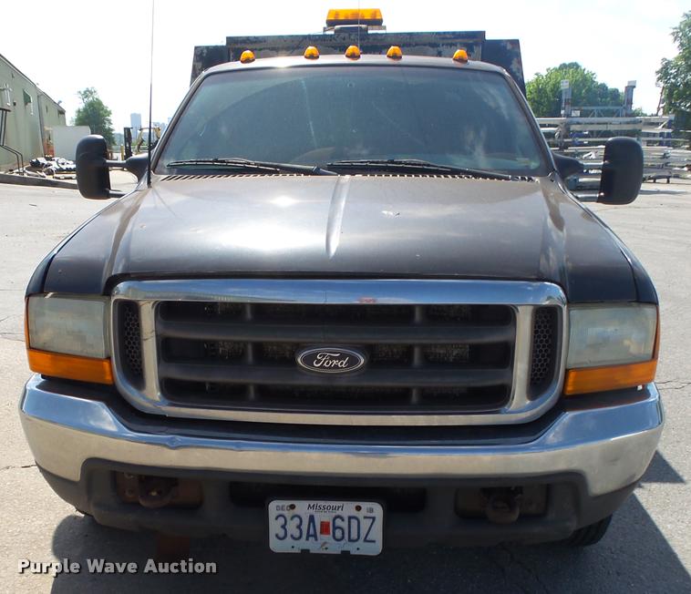 image for item DA2710 1999 Ford F350 Super Duty SuperCab utility bed pickup truck