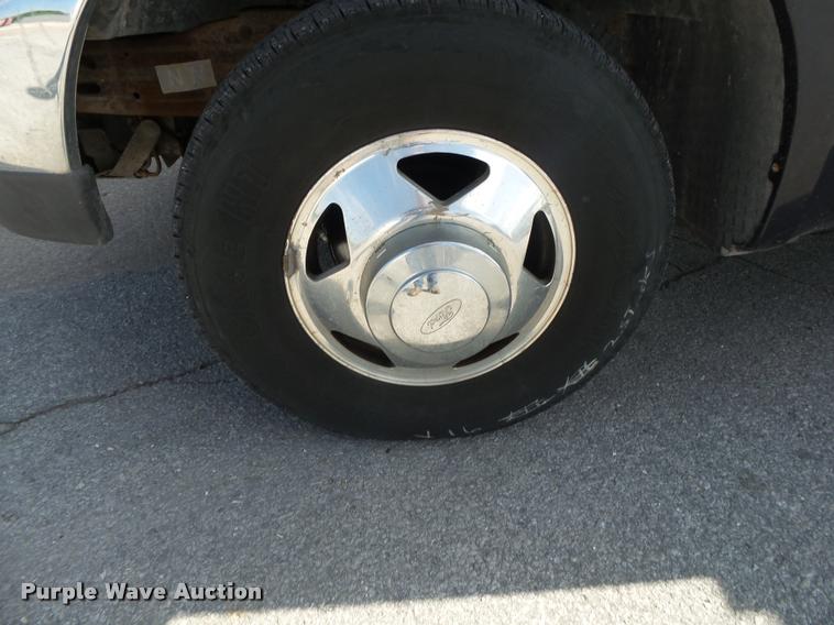 image for item DA2710 1999 Ford F350 Super Duty SuperCab utility bed pickup truck