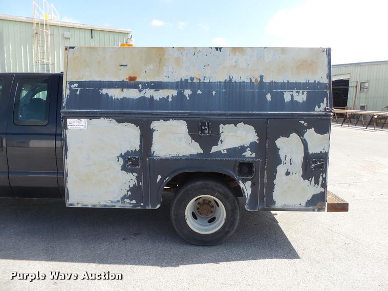 image for item DA2710 1999 Ford F350 Super Duty SuperCab utility bed pickup truck