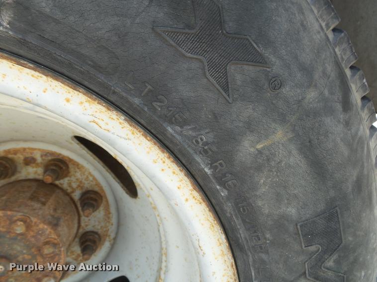 image for item DA2710 1999 Ford F350 Super Duty SuperCab utility bed pickup truck