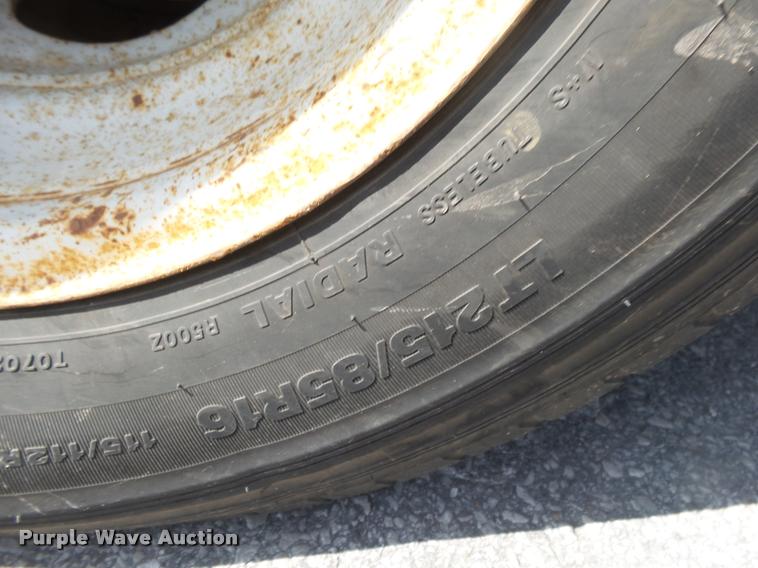 image for item DA2710 1999 Ford F350 Super Duty SuperCab utility bed pickup truck