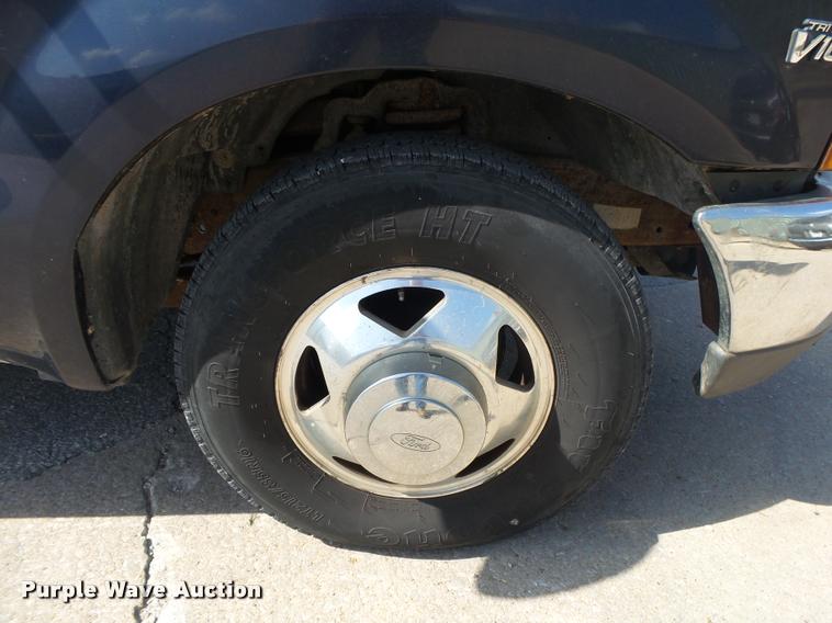 image for item DA2710 1999 Ford F350 Super Duty SuperCab utility bed pickup truck