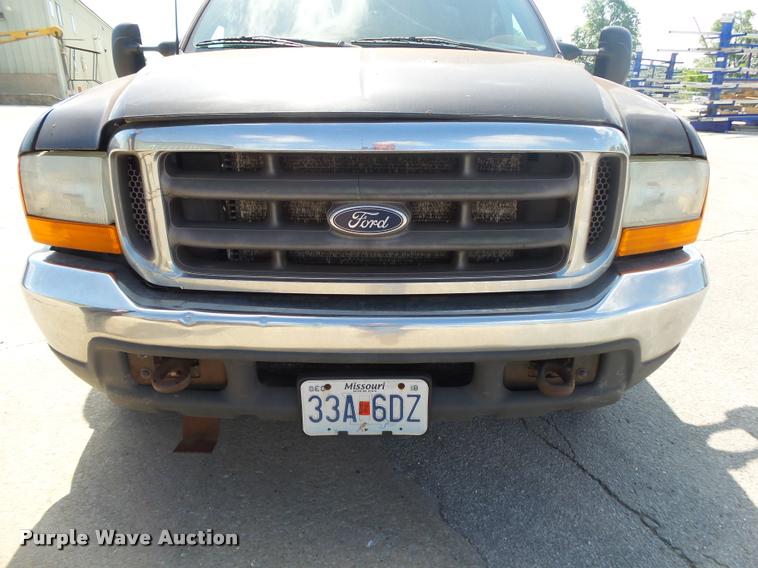 image for item DA2710 1999 Ford F350 Super Duty SuperCab utility bed pickup truck