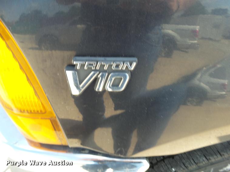 image for item DA2710 1999 Ford F350 Super Duty SuperCab utility bed pickup truck