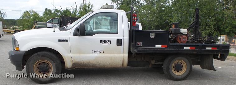 image for item DA2732 2003 Ford F250 Super Duty flatbed pickup truck