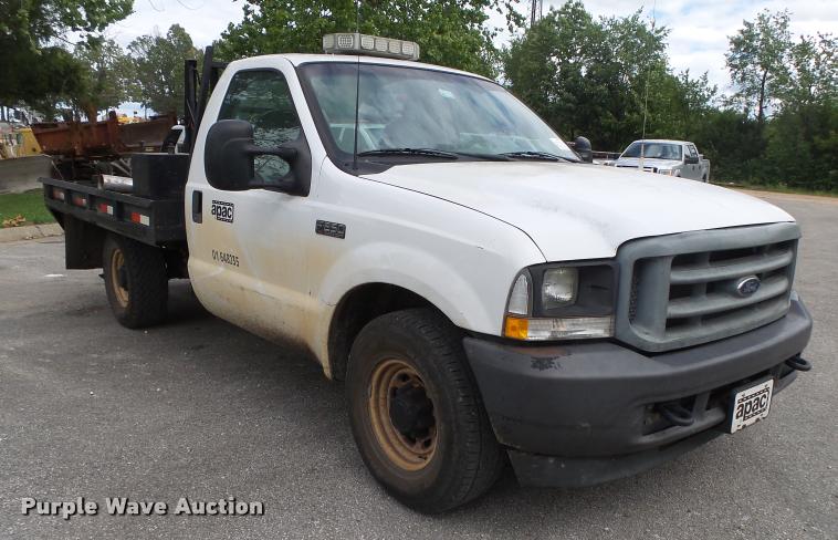 image for item DA2732 2003 Ford F250 Super Duty flatbed pickup truck