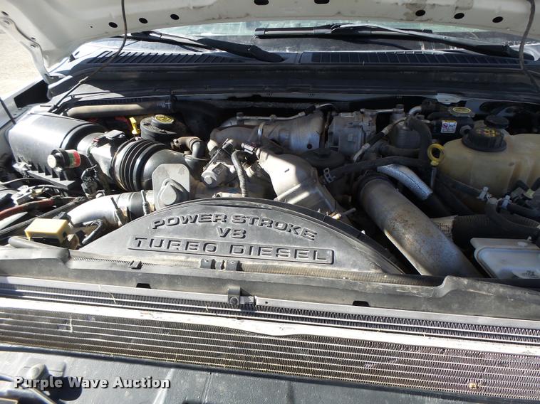 image for item DA3445 2010 Ford F350 Super Duty Crew Cab flatbed pickup truck