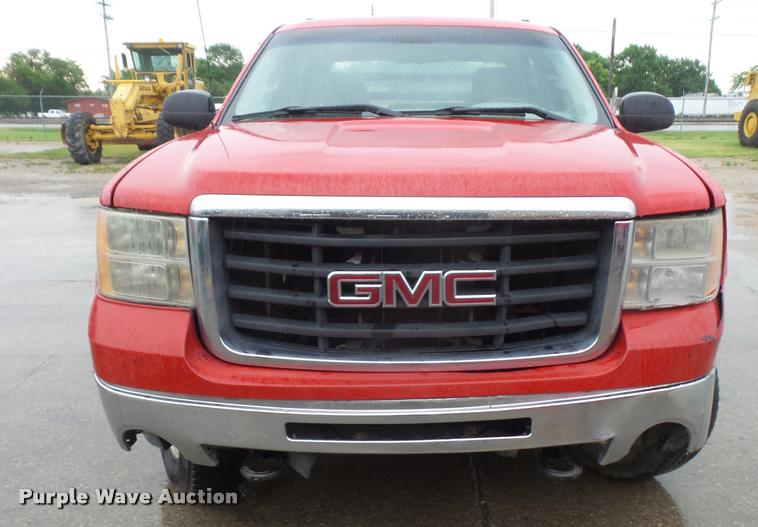image for item DA6353 2009 GMC Sierra 2500HD Crew Cab flatbed pickup truck