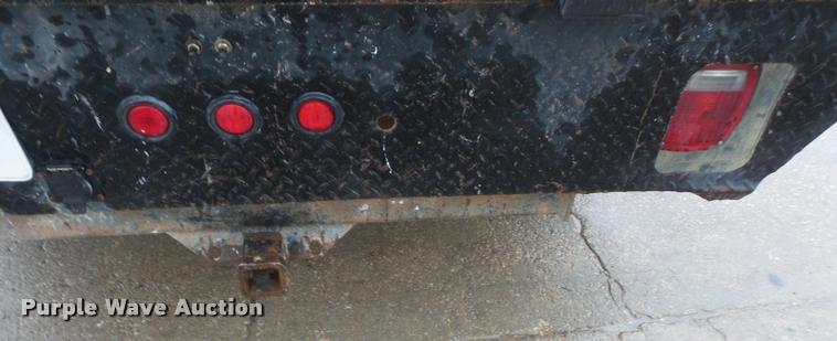 image for item DA6353 2009 GMC Sierra 2500HD Crew Cab flatbed pickup truck