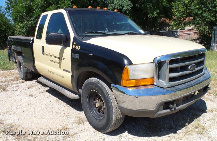 image for item DA6750 2000 Ford F350 Super Duty SuperCab utility bed pickup truck