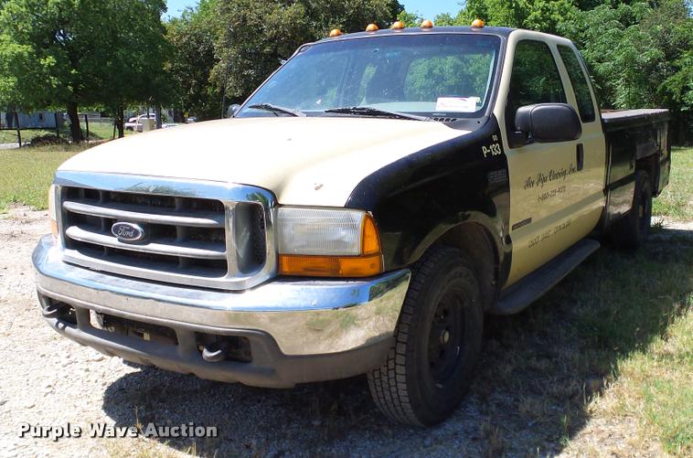 image for item DA6750 2000 Ford F350 Super Duty SuperCab utility bed pickup truck
