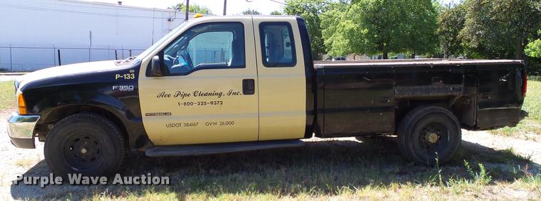 image for item DA6750 2000 Ford F350 Super Duty SuperCab utility bed pickup truck