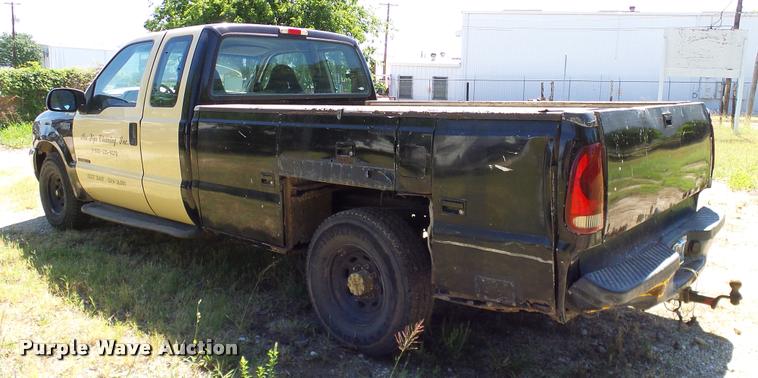 image for item DA6750 2000 Ford F350 Super Duty SuperCab utility bed pickup truck