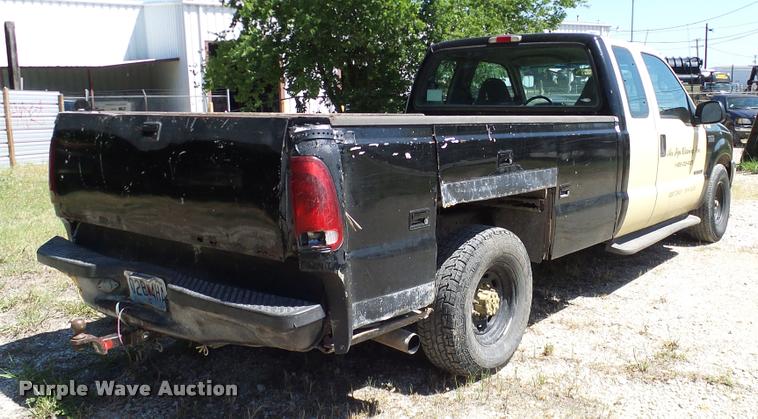 image for item DA6750 2000 Ford F350 Super Duty SuperCab utility bed pickup truck