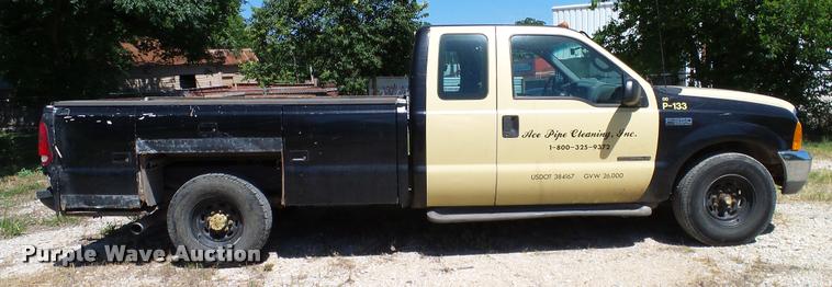 image for item DA6750 2000 Ford F350 Super Duty SuperCab utility bed pickup truck