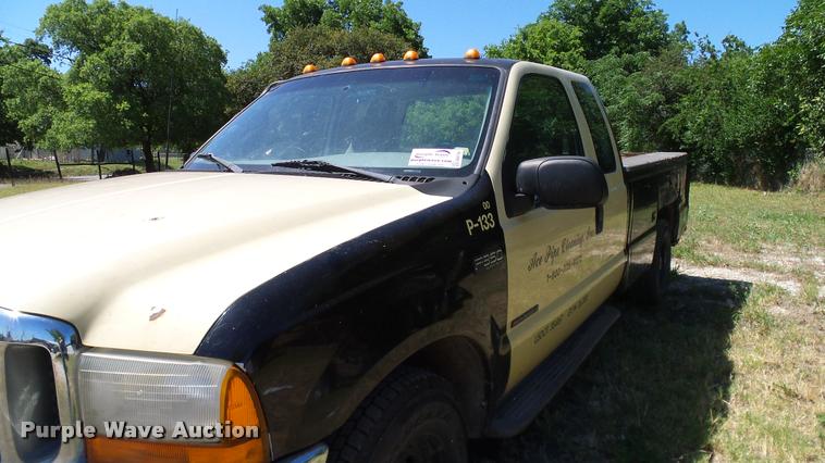 image for item DA6750 2000 Ford F350 Super Duty SuperCab utility bed pickup truck