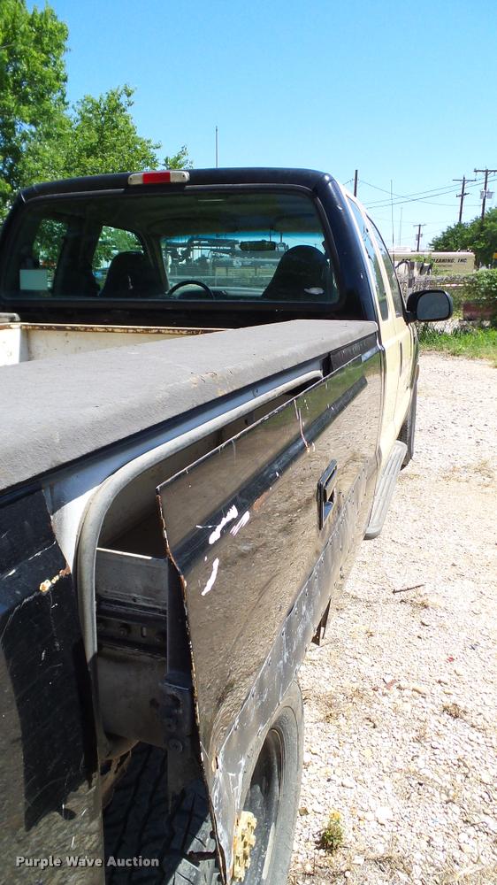 image for item DA6750 2000 Ford F350 Super Duty SuperCab utility bed pickup truck