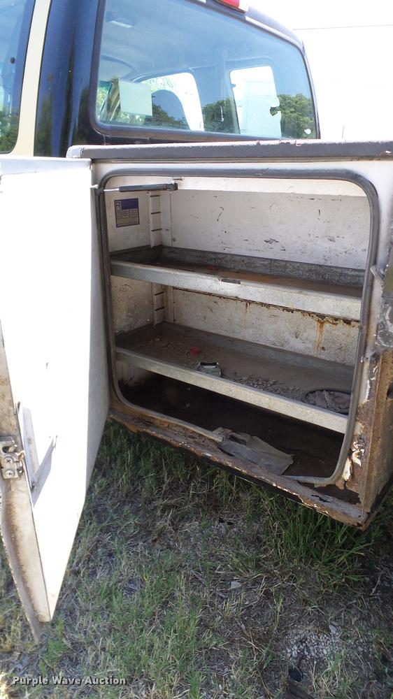 image for item DA6750 2000 Ford F350 Super Duty SuperCab utility bed pickup truck