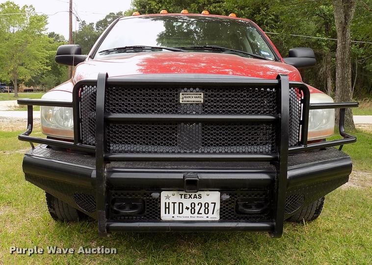 image for item DK9997 2006 Dodge Ram 3500 Quad Cab flatbed pickup truck