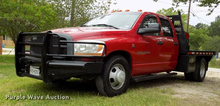 image for item DK9997 2006 Dodge Ram 3500 Quad Cab flatbed pickup truck