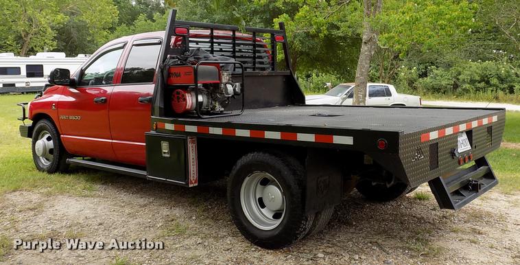 image for item DK9997 2006 Dodge Ram 3500 Quad Cab flatbed pickup truck