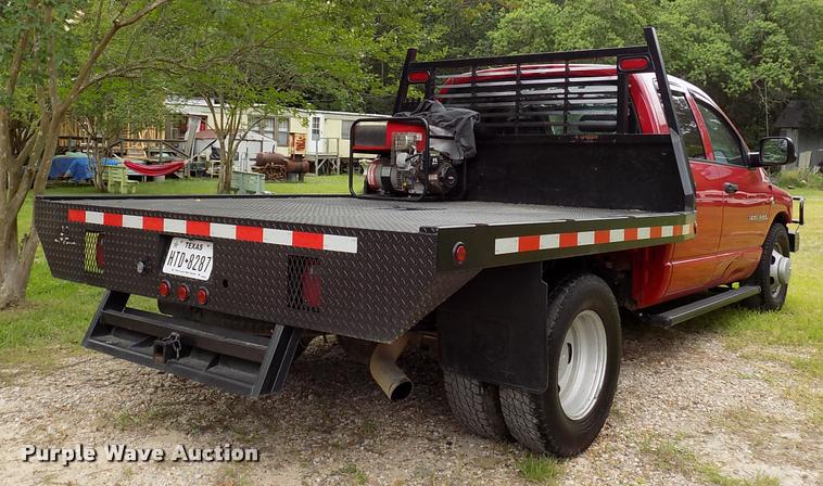 image for item DK9997 2006 Dodge Ram 3500 Quad Cab flatbed pickup truck