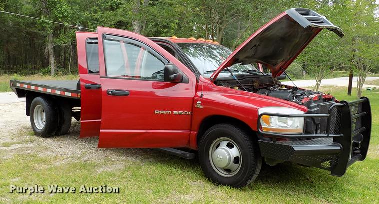 image for item DK9997 2006 Dodge Ram 3500 Quad Cab flatbed pickup truck