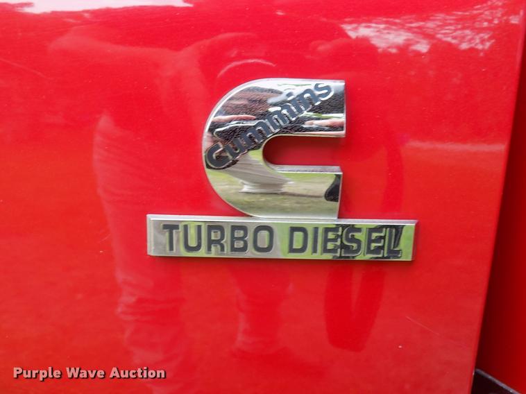 image for item DK9997 2006 Dodge Ram 3500 Quad Cab flatbed pickup truck