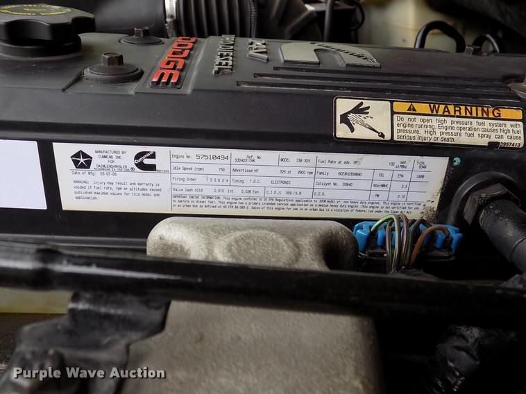 image for item DK9997 2006 Dodge Ram 3500 Quad Cab flatbed pickup truck