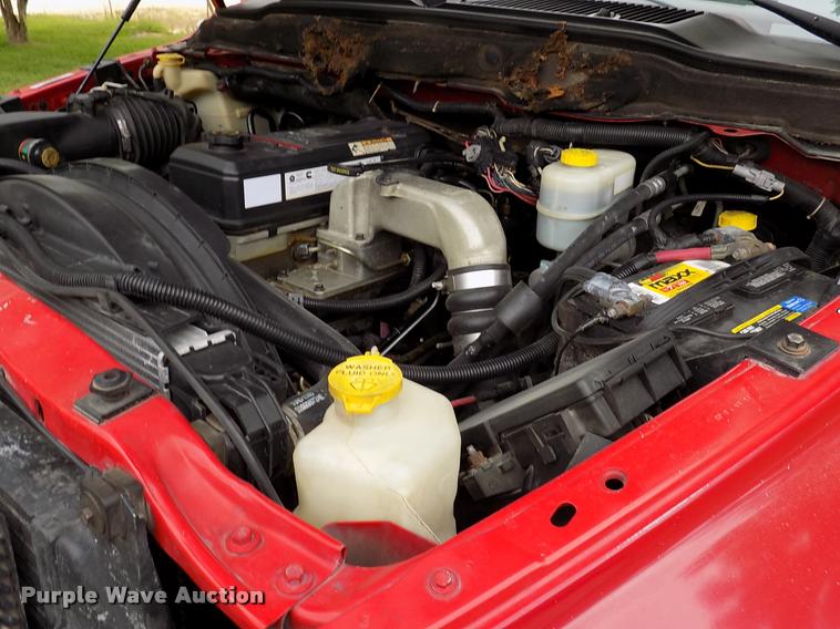 image for item DK9997 2006 Dodge Ram 3500 Quad Cab flatbed pickup truck