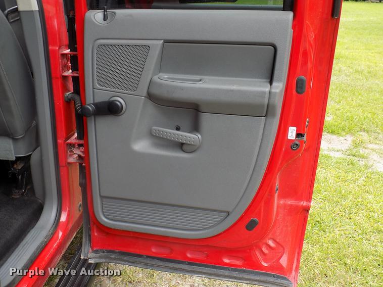 image for item DK9997 2006 Dodge Ram 3500 Quad Cab flatbed pickup truck