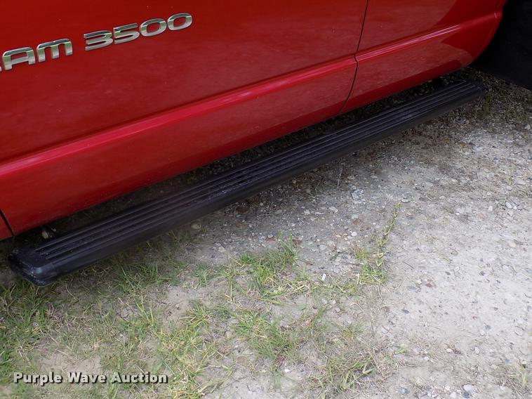 image for item DK9997 2006 Dodge Ram 3500 Quad Cab flatbed pickup truck