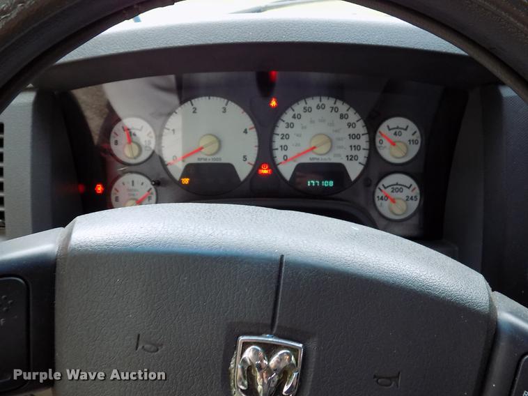 image for item DK9997 2006 Dodge Ram 3500 Quad Cab flatbed pickup truck