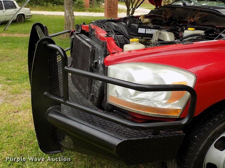 image for item DK9997 2006 Dodge Ram 3500 Quad Cab flatbed pickup truck