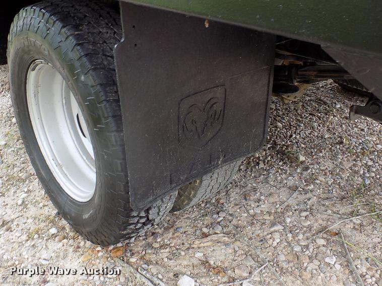 image for item DK9997 2006 Dodge Ram 3500 Quad Cab flatbed pickup truck