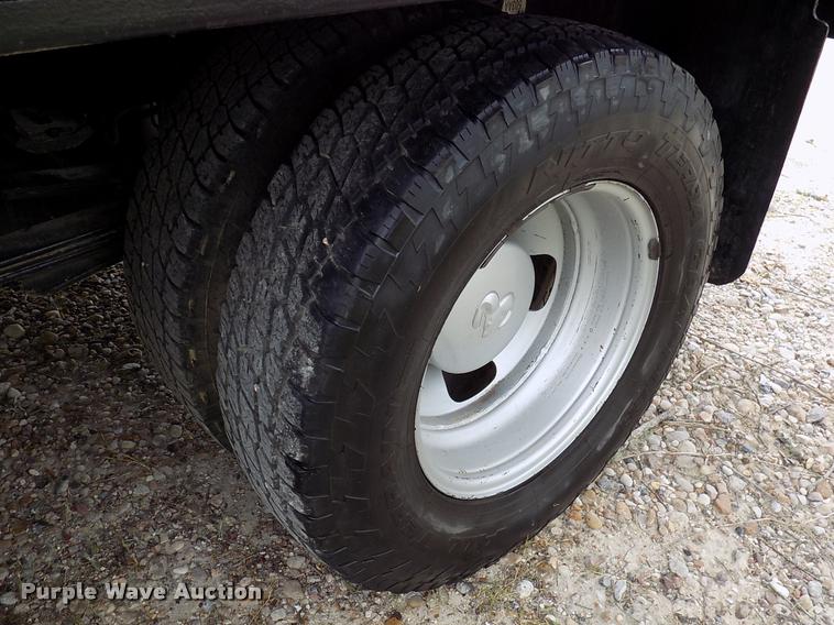 image for item DK9997 2006 Dodge Ram 3500 Quad Cab flatbed pickup truck