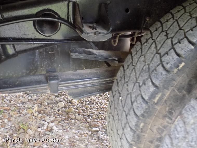 image for item DK9997 2006 Dodge Ram 3500 Quad Cab flatbed pickup truck