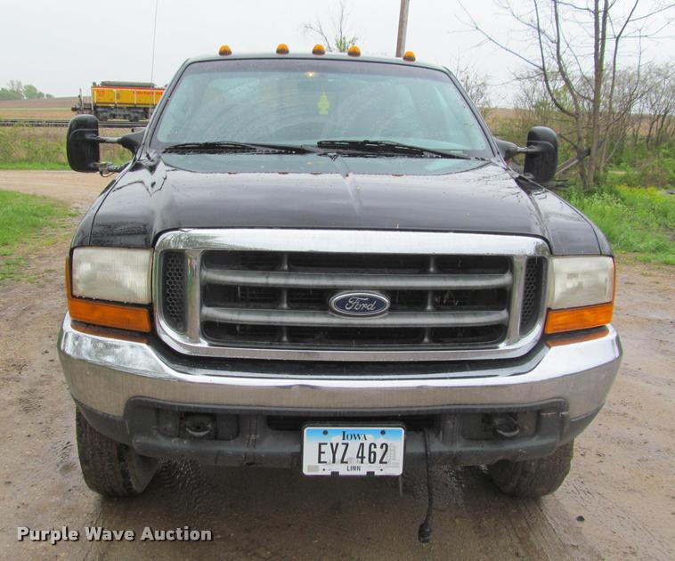 image for item K4757 2000 Ford F350 Super Duty XLT utility bed pickup truck