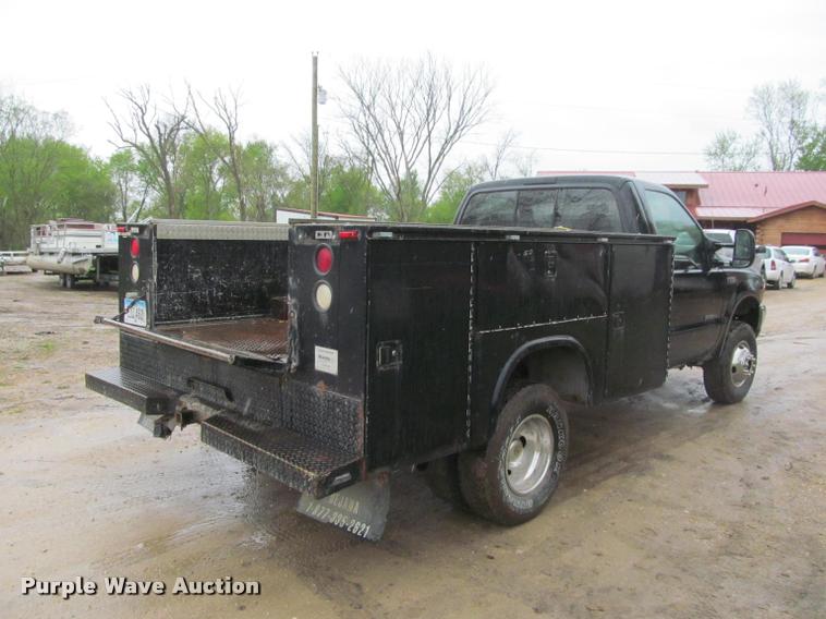 image for item K4757 2000 Ford F350 Super Duty XLT utility bed pickup truck