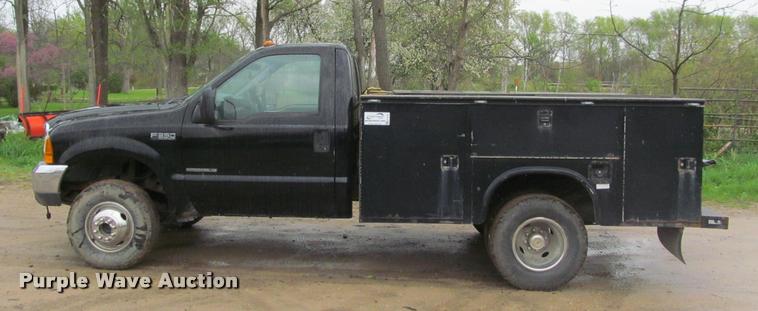 image for item K4757 2000 Ford F350 Super Duty XLT utility bed pickup truck