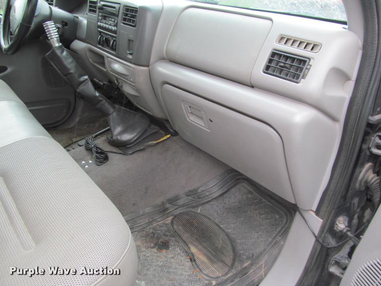 image for item K4757 2000 Ford F350 Super Duty XLT utility bed pickup truck