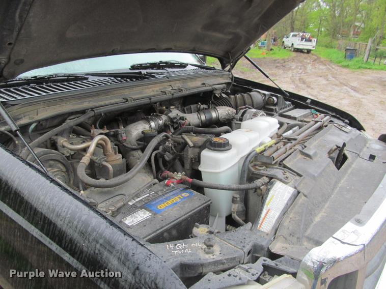 image for item K4757 2000 Ford F350 Super Duty XLT utility bed pickup truck